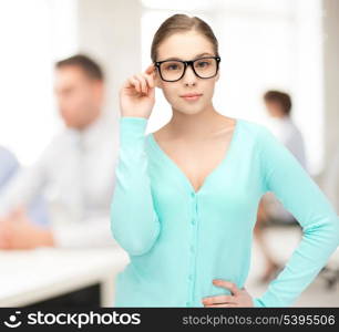 portrait of sweet young girl wearing eyeglasses