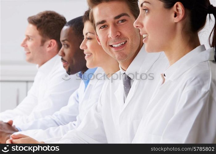 Portrait Of Technician In Laboratory With Colleagues