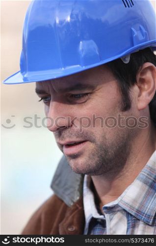 Portrait of technician wearing hardhat