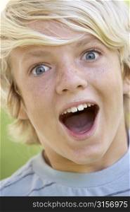 Portrait Of Teenage Boy Looking Excited