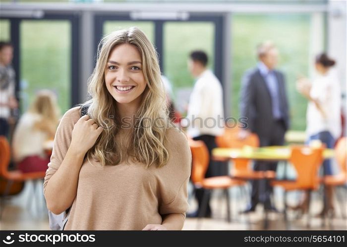 Portrait Of Teenage Female Student In Classroom