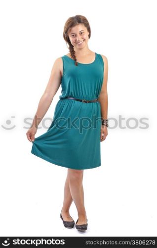 portrait of teenage girl in a green dress on a white background