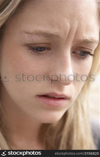 Portrait Of Teenage Girl Looking Upset