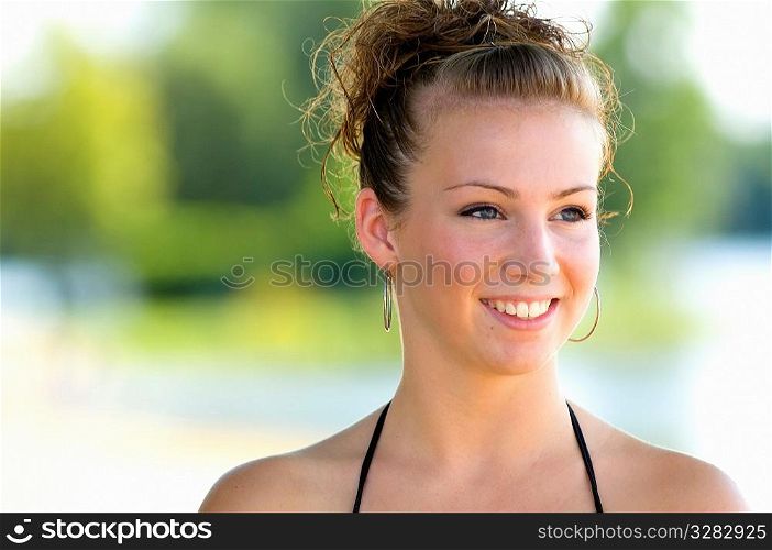 Portrait of teenage girl on beach.
