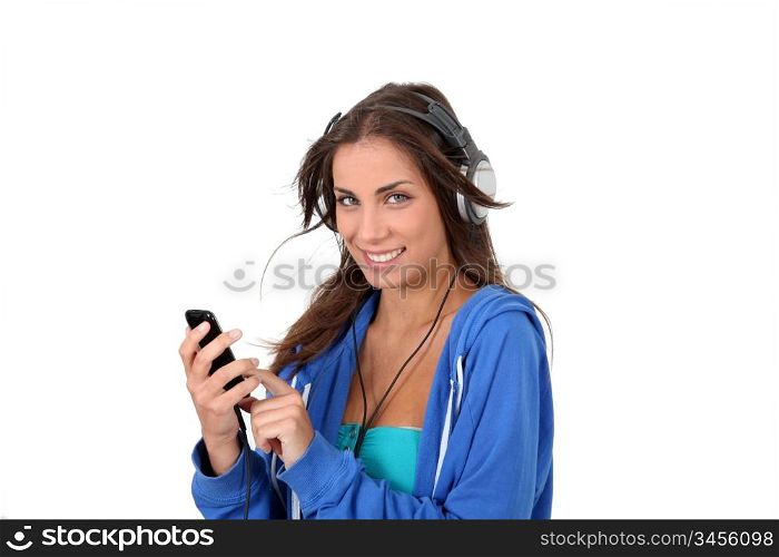Portrait of teenager listening to music with headphones