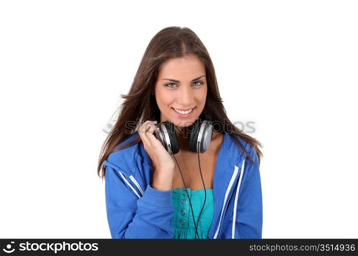 Portrait of teenager listening to music with headphones