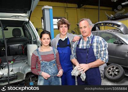 Portrait of teenagers in mechanics training course