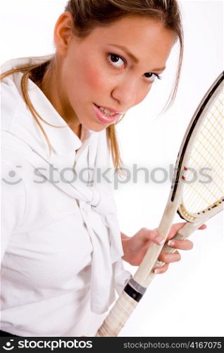 portrait of tennis player looking at camera on an isolated white background