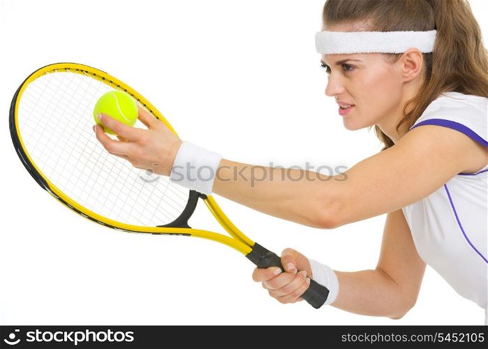 Portrait of tennis player ready to serve ball