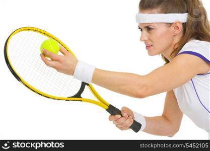 Portrait of tennis player ready to serve ball
