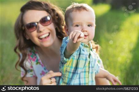 Portrait of the adorable mom with cute baby son