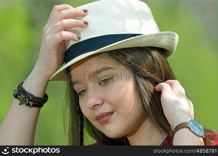 Portrait of the beautiful girl outdoor on spring day