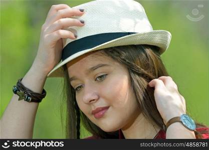 Portrait of the beautiful girl outdoor on spring day