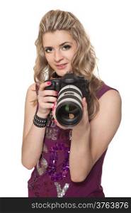Portrait of the beautiful girl with a photo camera