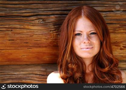 Portrait of the beautiful red-haired girl