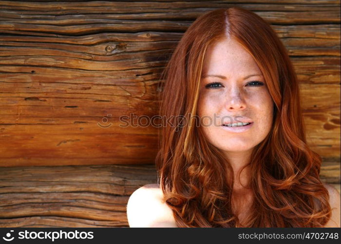 Portrait of the beautiful red-haired girl
