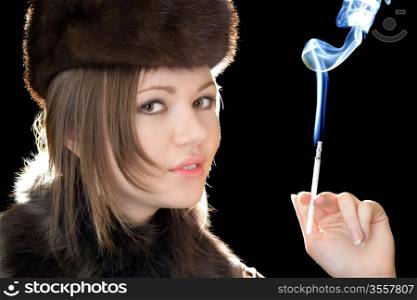 Portrait of the beautiful woman with a cigarette