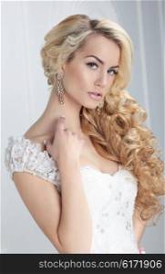 Portrait of the bride. Hairstyle, long blonde hair.