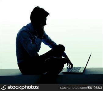 Portrait of the businessman with laptop