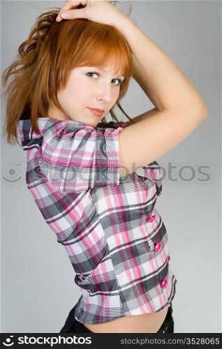 Portrait of the girl in a checkered shirt