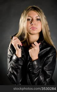 Portrait of the girl in a leather jacket