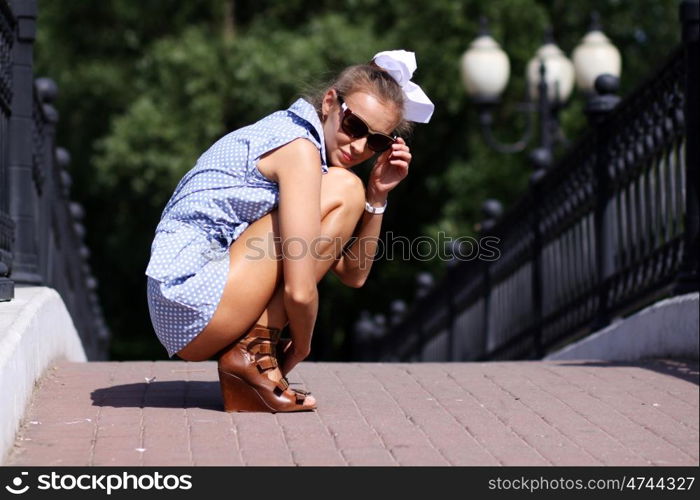 Portrait of the girl to the utmost against street