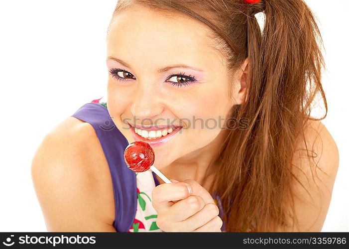 Portrait of the girl with a sweet sugar candy isolated