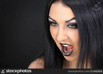 Portrait of the Gothic woman on a black background