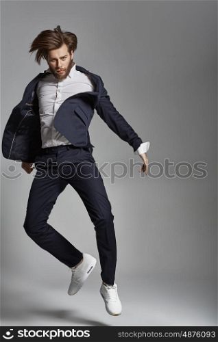 Portrait of the jumping flexible man