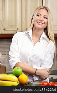 Portrait of the nice girl on kitchen