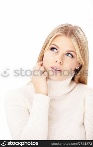 Portrait of the pensive blonde isolated on a white background