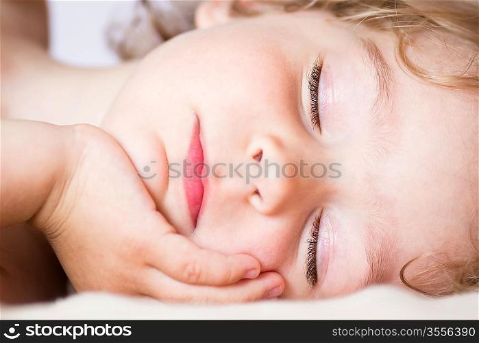Portrait of the sleeping beautiful baby girl