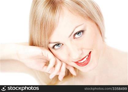 Portrait of the smiling blonde on a white background