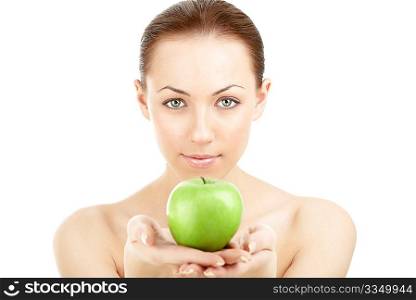 Portrait of the woman with a green apple in the hands, isolated