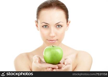 Portrait of the woman with a green apple in the hands, isolated