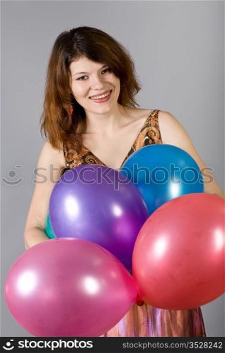 Portrait of the young girl with New Year&rsquo;s full-spheres