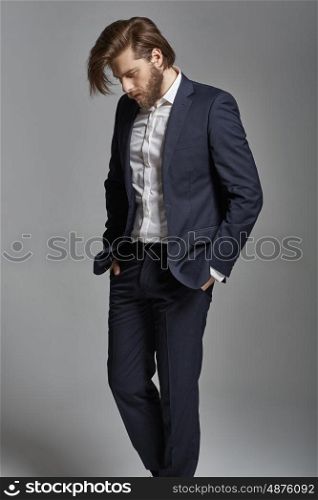 Portrait of the young handsome stylish businessman