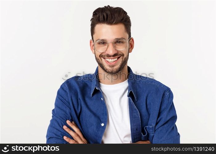 Portrait of the young happy smiling handsome man isolated on a white background.. Portrait of the young happy smiling handsome man isolated on a white background