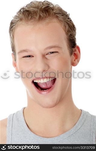 Portrait of the young happy smiling man isolated on a white background