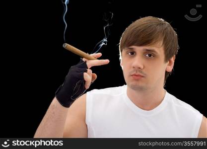 Portrait of the young man with cigar. Isolated