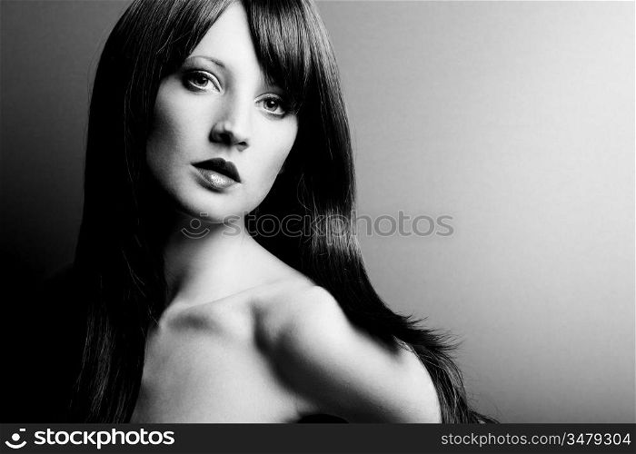 Portrait of the young sexual woman closeup. The Black-and-white photo