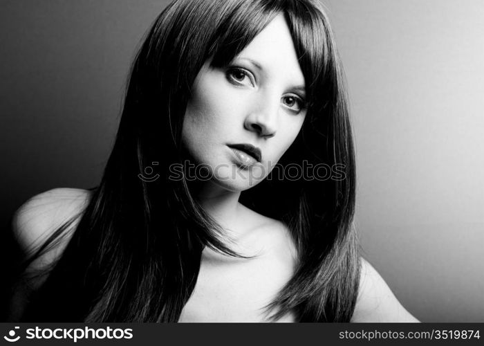 Portrait of the young sexual woman closeup. The Black-and-white photo