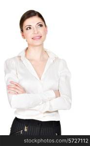 Portrait of the young smiling thinking woman looks up in white shirt - isolated on white background.