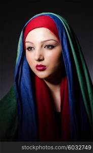 Portrait of the young woman with headscarf