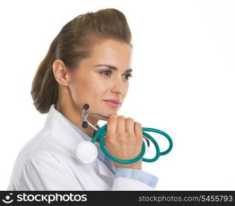 Portrait of thoughtful doctor woman with stethoscope