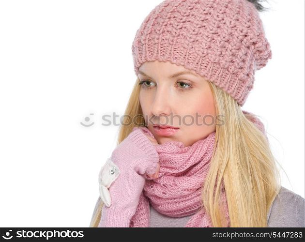 Portrait of thoughtful girl in winter clothes