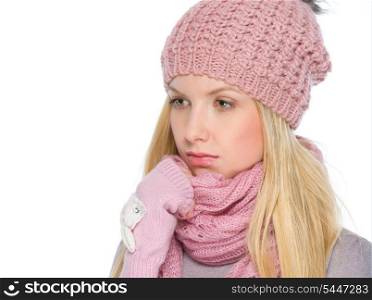 Portrait of thoughtful girl in winter clothes