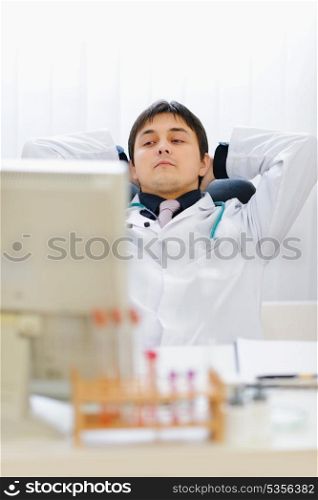 Portrait of thoughtful medical doctor at office