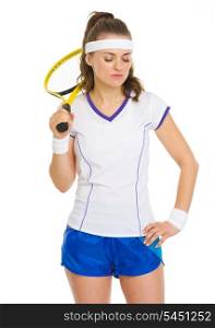 Portrait of thoughtful tennis player with racket