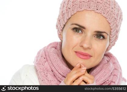 Portrait of thoughtful young woman in knit winter clothes